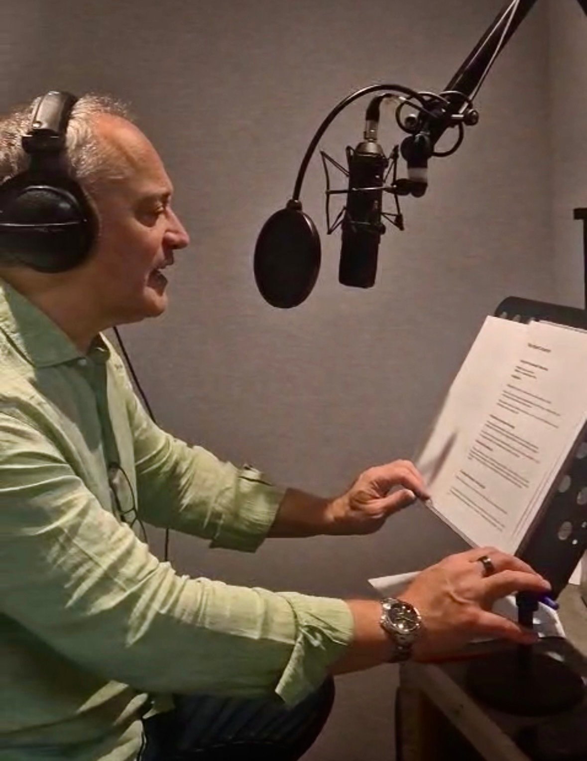 Chris Chiaro recording voice-over in the studio